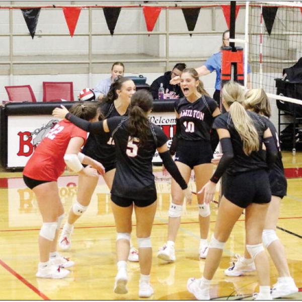 HARD-FOUGHT VICTORY: The Lady Bulldogs push McGregor to the limit and learn a way to win in five sets. The Lady Bulldogs celebrate after coming together and completing a comeback. Photos by Jaxon Hansard
