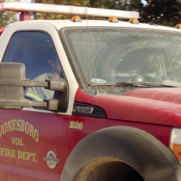 Fire departments from all over Central Texas joined the effort in battling the Rio Escondido fire including these volunteers from Jonesboro. Photo by Grant Lengefeld