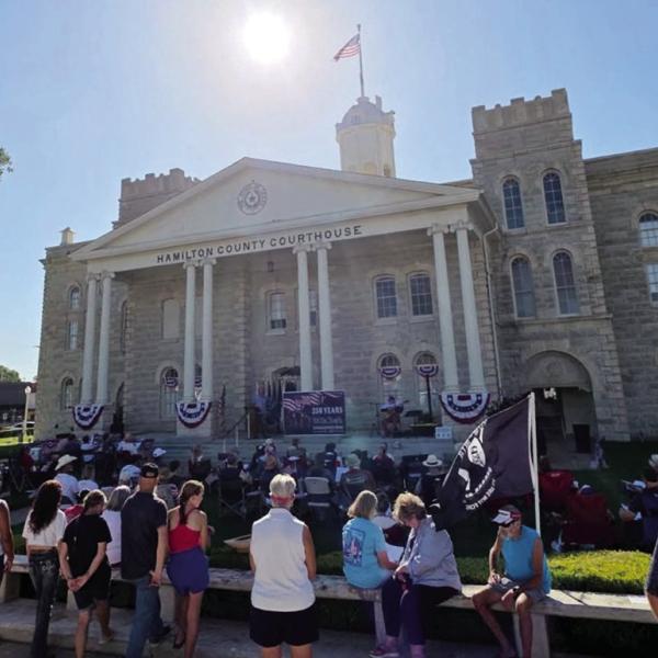 COMMUNITY INDEPENDENCE: Hamilton residences showed up at the courthouse lawn to celebrate 250 years of American Independence. A reading of the Declaration of Independence, a tribute to the flags and music from Wade Paul Johnson. Courtesy Photo