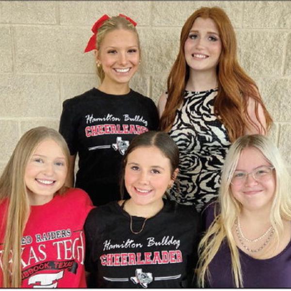The 2026 Hamilton Homecoming court freshman duchess Carolina DeLaGarza (front left), sophomore duchess Maisyn Norton and junior duchess Jocelyn Elliott join senior queen nominees Emery McElroy (back left) and Chaise Boone. Not pictured is nominee Jovana Flores. The queen, selected by Hamilton High School students, will be announced at halftime during the Bulldogs’ Homecoming match against Dublin Oct. 9. Courtesy photo
