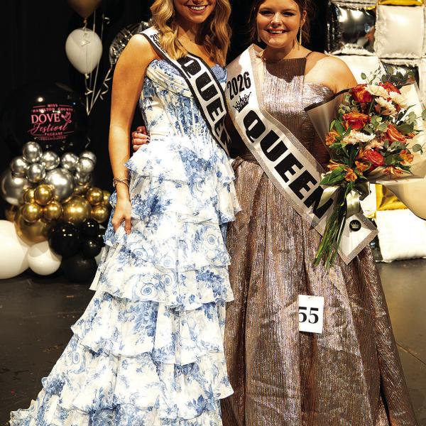 This year’s Miss Hamilton County Dove Festival Queen Alexa Vance (right) poses with her predecessor, Emery McElroy. Photo by Kelsey Sue Photography