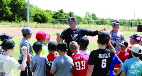 FAMILIAR FACES ON THE DIAMOND: Hamilton Junior High’s newest teacher and assistant coach, Sutton Lee hosted his baseball camp with fellow 2023 HHS graduate and current collegiate baseball player Chase Weaver. Weaver pitches for the West Texas A&amp;M Buffaloes in Canyon, and Lee played outfield for the Concordia Tornadoes in Austin. With about 40 kids registered for camp, the fundamentals of throwing and fielding the ball are a priority for the younger kids.