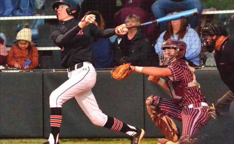 Dogs win district opener