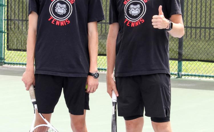 HHS Tennis makes district haul