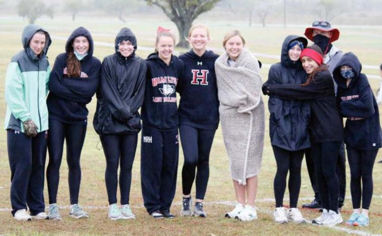 Regional bound XC Dogs, Lady Dogs sweep district