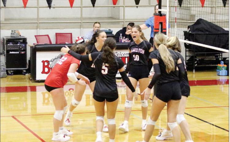 HARD-FOUGHT VICTORY: The Lady Bulldogs push McGregor to the limit and learn a way to win in five sets. The Lady Bulldogs celebrate after coming together and completing a comeback. Photos by Jaxon Hansard