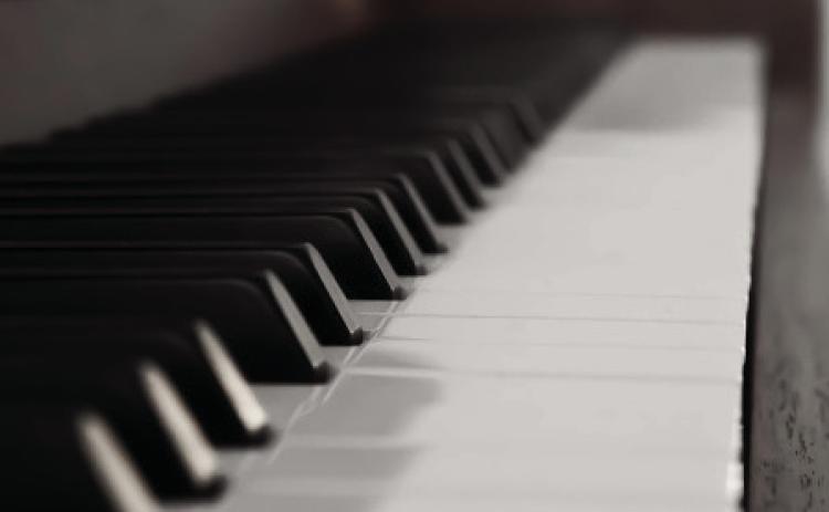 Dueling Pianos to play for Boots & Bling