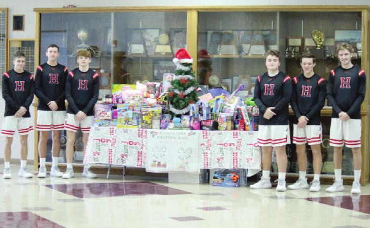 HHS hoopers collect toys, wins