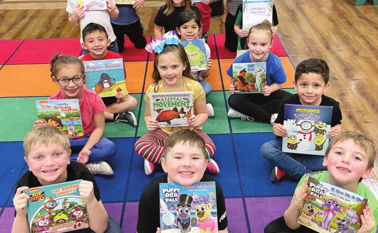 First graders get new books!