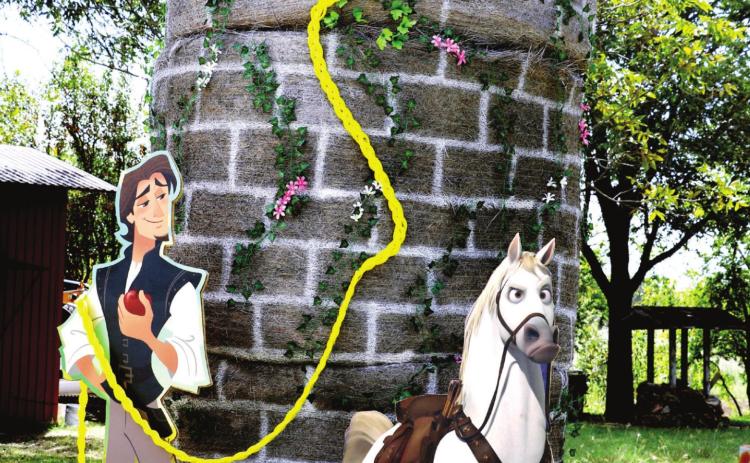 A Rapunzel themed hay bale tower