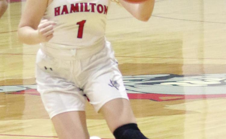 Lady Dogs tip off district Tuesday