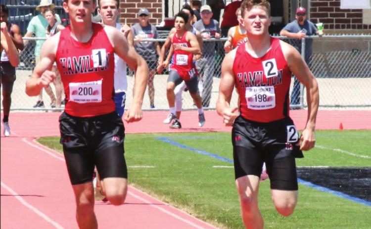 HHS Track sends 9 to state; Dogs back-to-back regional champions