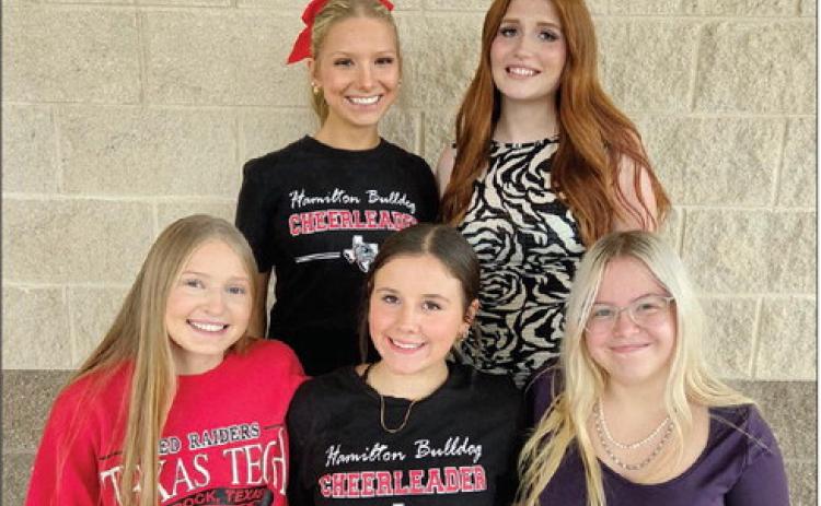 The 2026 Hamilton Homecoming court freshman duchess Carolina DeLaGarza (front left), sophomore duchess Maisyn Norton and junior duchess Jocelyn Elliott join senior queen nominees Emery McElroy (back left) and Chaise Boone. Not pictured is nominee Jovana Flores. The queen, selected by Hamilton High School students, will be announced at halftime during the Bulldogs’ Homecoming match against Dublin Oct. 9. Courtesy photo