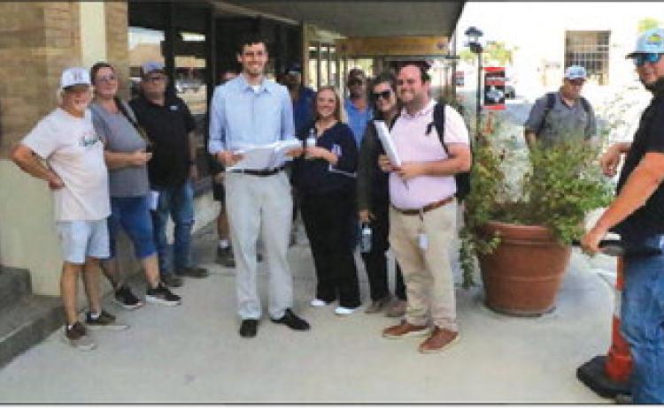 Pictured is Mayor Pro-Tem Doug Baker, City Manager Nayda Santana, Executive Assistant to the City Manager Brooke Waters, Public Works Director Clay Boatwright, Streets Supervisor Benito Martinez, Pape-Dawson Project Manager Trevor Riek, and Pape-Dawson Project Engineer Tyler Campbell. Photo by Mark Henry