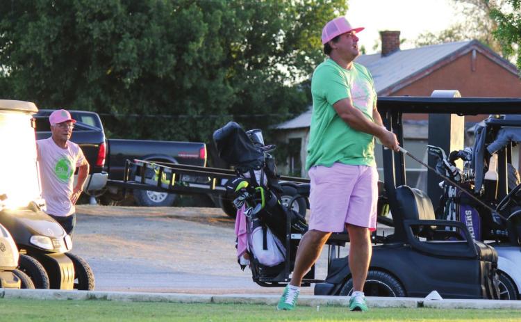 TEEING OFF