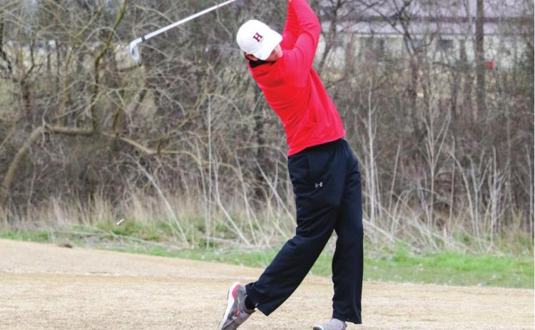 TEEING OFF