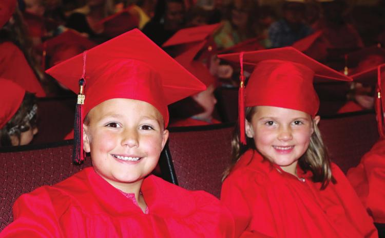 Kindergarten students graduate to first grade