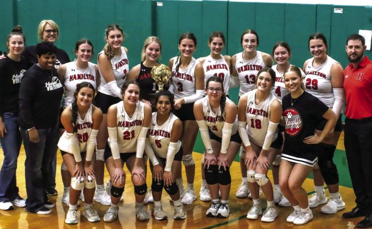 Lady Dogs tap third straight area title