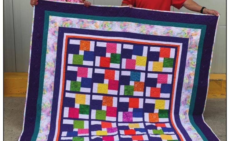 	QUILT DONATED FOR DORIS GLOVER SCHOLARSHIP 