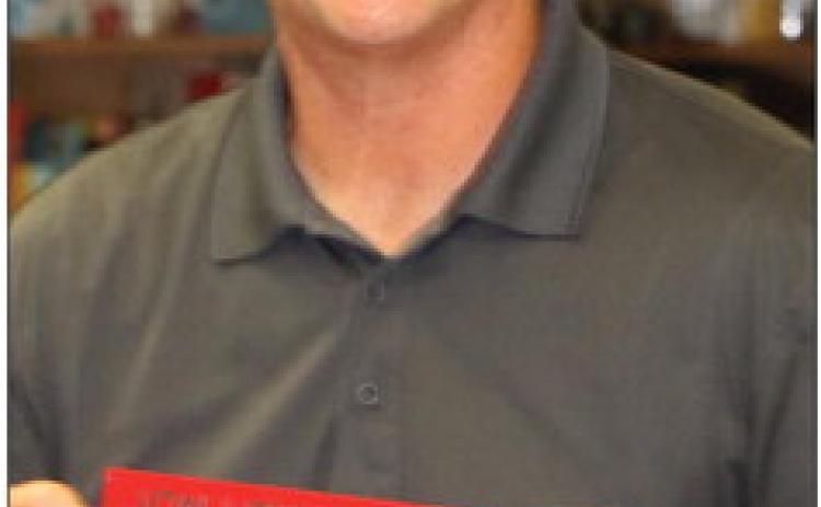 WHAT’S HE SO HAPPY ABOUT? 