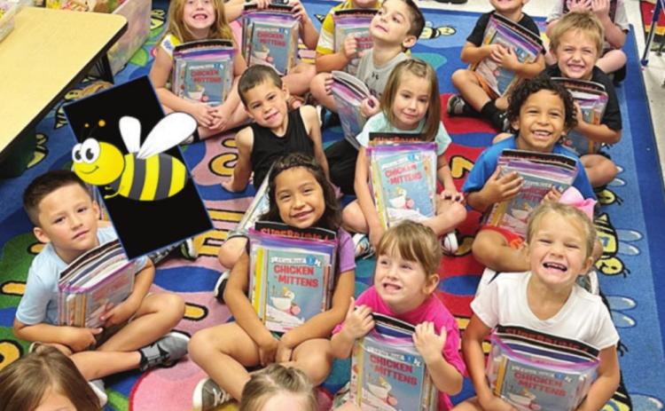 Kindergarten students get their own books