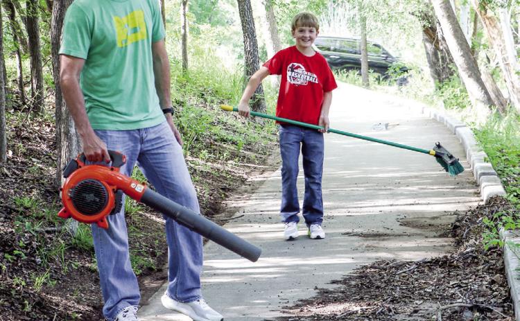 Volunteers spruce up parks, square