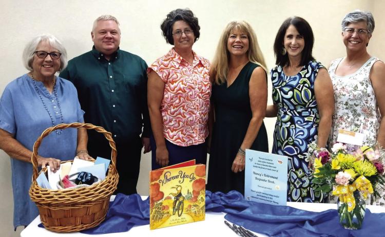 Board room to back yard...Diaz, Payne celebrated for years of hard work