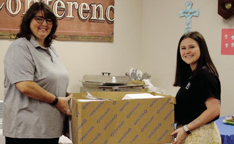 Volunteers make center work